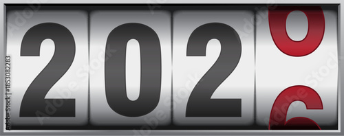 New year mechanical counter showing 2025 switching to 2026 on bright background