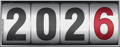 New year mechanical counter showing 2025 switching to 2026 on bright background