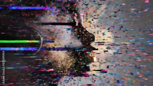 Silhouette profile of a woman with gold lips wearing headphones with colorful digital glitch particles exploding. Music and data visualization concept