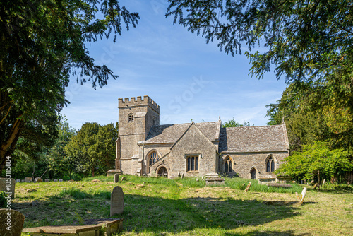 The parish church of St Peter dating back to the 13th century in the Cotswold village of Alvescot, Oxfordshire, England UK