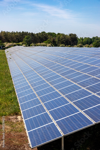 Large array of solar panels at Kencot Hill Solar Farm on the old RAF Broadwell airfield near Carterton, Oxfordshire, England UK