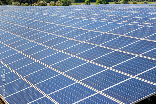 Large array of solar panels at Kencot Hill Solar Farm on the old RAF Broadwell airfield near Carterton, Oxfordshire, England UK