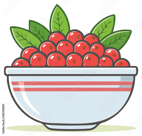 Bowl of ripe red fruit with green leaves