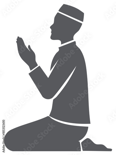 Silhouette of a man in traditional Islamic attire praying