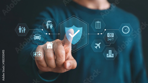 Businessman touching digital screen with insurance icons image