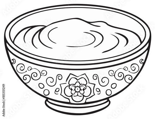 Outlined bowl filled with dip or dessert featuring floral and spiral decorative elements