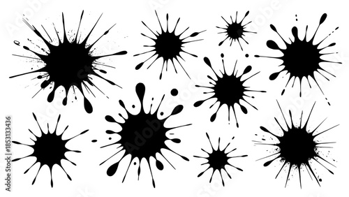 Abstract set of irregular black ink splatters on white background
