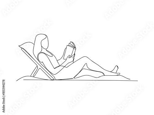 Woman Reading On Beach Line