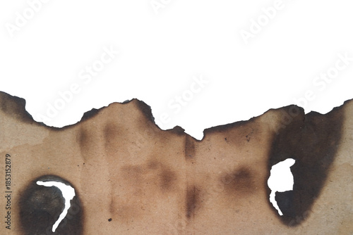 Distressed burned paper texture with jagged edges and charred holes for an aged effect isolated on transparent background