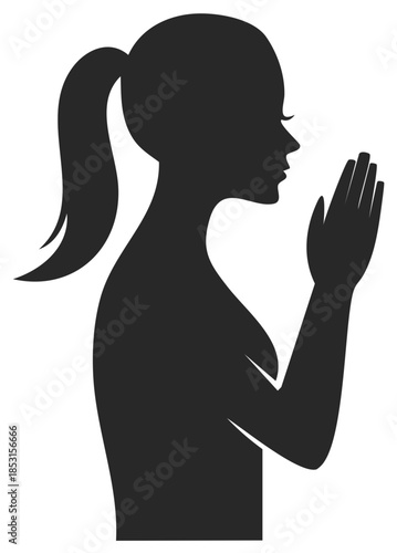 Silhouette of a Woman Praying with Hands Clasped in Supplication Gesture