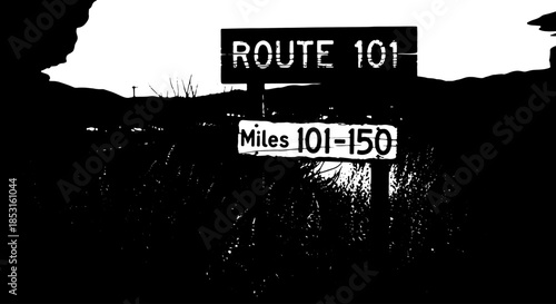 Desolate black and white Route 101 sign on a rural road at dusk.