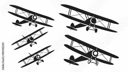 Vector illustration set of four black biplane silhouettes
