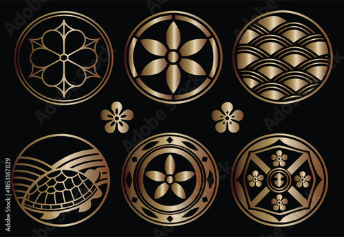 A collection of ornate japanese mon symbols in shades of gold and brown showcasing traditional floral and animal motifs in circular designs