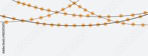 PNG Twinkling fairy lights glow in soft amber. Golden garland loops around festive corner.  Holiday sparkle brightens the dark scene