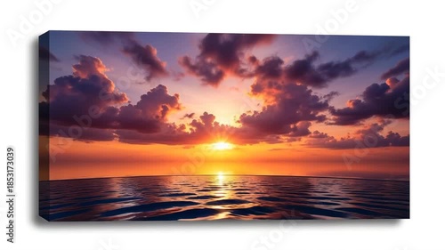 This image captures a breathtaking sunset over a serene body of water. The sky is painted with hues of orange, purple, and pink, creating a stunning backdrop. The sun is partially obscured by clouds, 