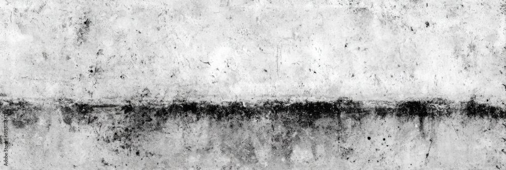 Fototapeta premium Grunge textured concrete wall with weathered appearance in black and white