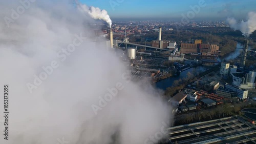 Plant chimney emitting smoke, global climate change. Gorgeous aerial view drone