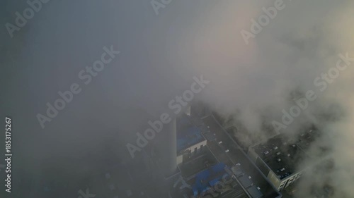 Plant chimney emitting smoke, global climate change. Great aerial view drone