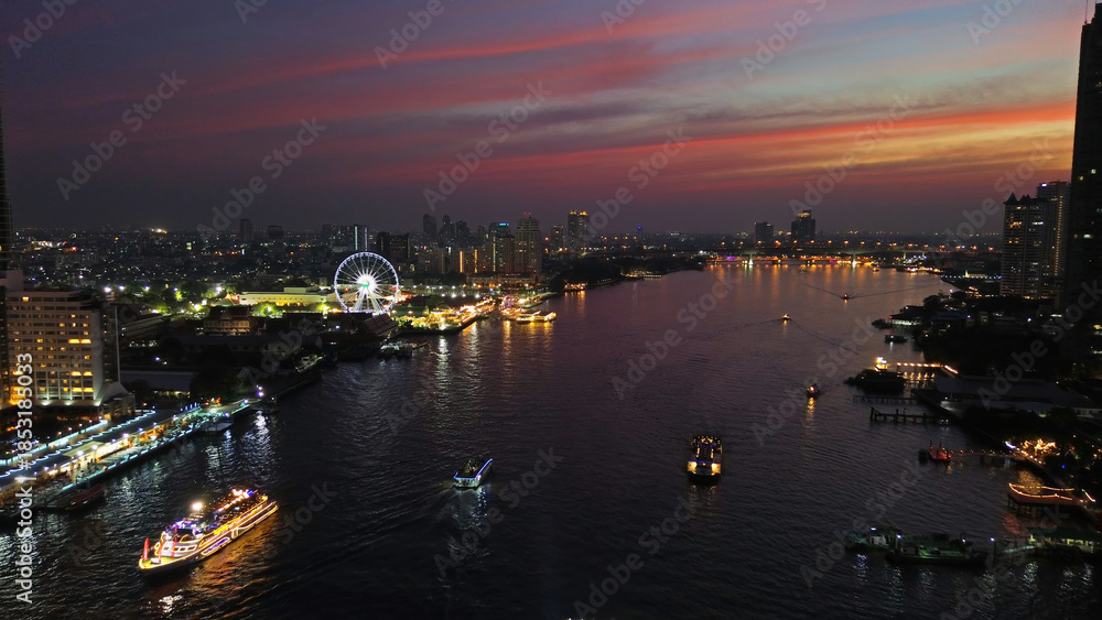 Obraz premium Skyscrapers in Bangkok city and river at night