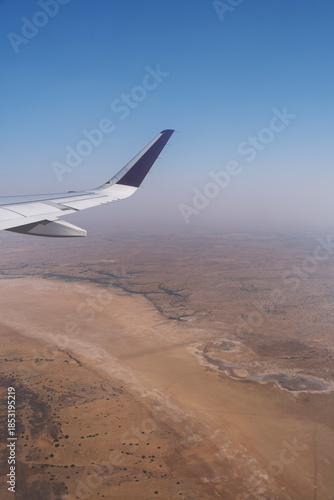 Flying over Rajasthan, India. Dry land in the desert, aerial view.	
