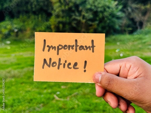 Important announcement sign holding, Important notification icon postcard, Important notice hand note image with green backdrop