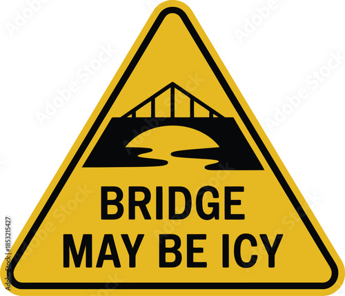 Yellow road sign warning of icy bridge conditions ahead