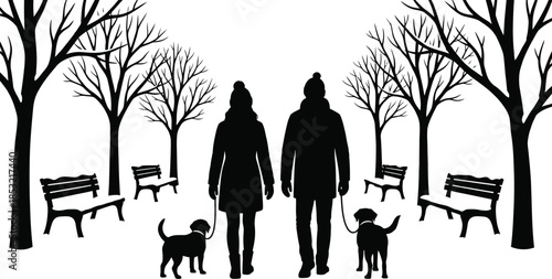 People walking dog in snowy winter park