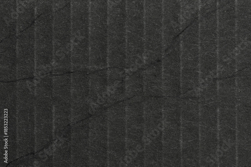 Old black wall background with abstract concrete texture, scratches, cracks, and vintage frame style, ideal for dark design concepts.