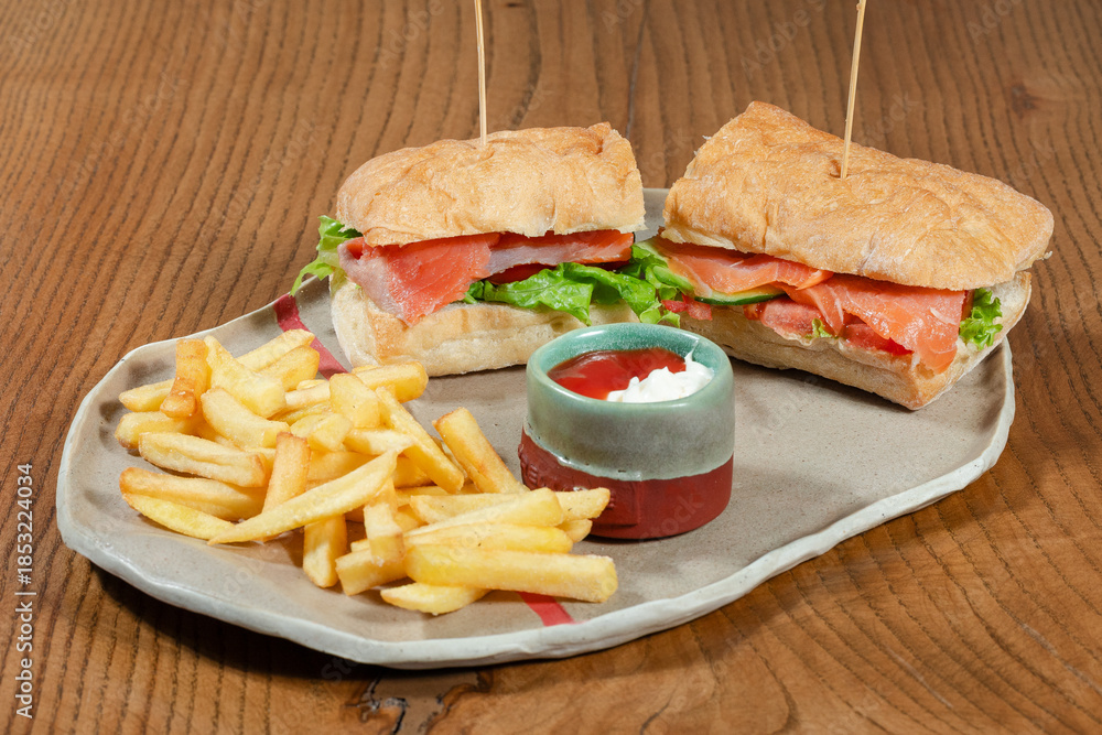 Obraz premium Sandwich and fries on plate