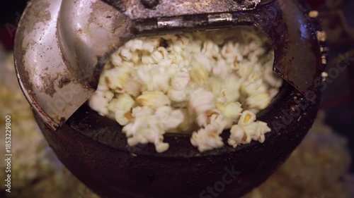 Selling popcorn at street food stall, India