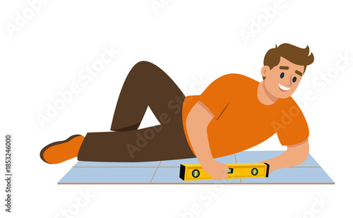 Smiling man laying tiles – floor leveling illustration