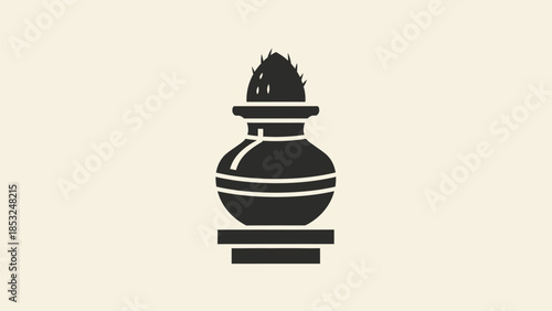 A graphic illustration of a traditional Indian lamp on a table indoors.