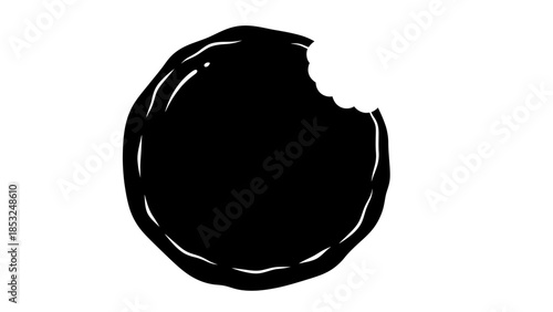 An illustration of a bitten black circular object with rough edges on a white background, viewed directly from the front.