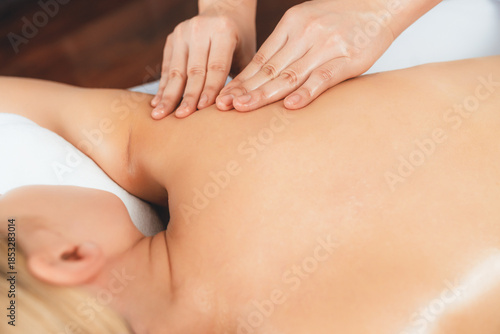 Wallpaper Mural Closeup woman customer enjoying relaxing anti-stress spa massage and pampering with beauty skin recreation leisure in day light ambient salon spa at luxury resort or hotel. Quiescent Torontodigital.ca