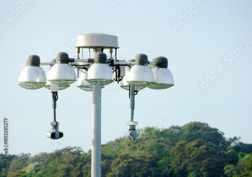 Modern Port Surveillance and LED Lighting System with PTZ Cameras on Harbor Mast