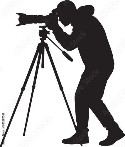 Silhouette of a photographer with a camera on a tripod photography