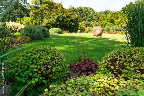Beautiful nature refreshing recreational grass lawn at Rhododendron Park and Botanical Gardens, Bremen, Germany.