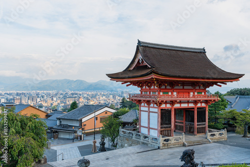 The panoramic early morning view of the Kyoto skyline and distant mountains in Japan.