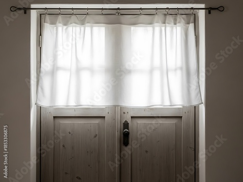 Rustic charm of a weathered wooden door with sheer curtain softness