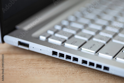 Close-up of gray keyboard and ports