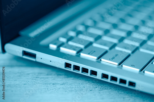 Close-up of gray keyboard and ports