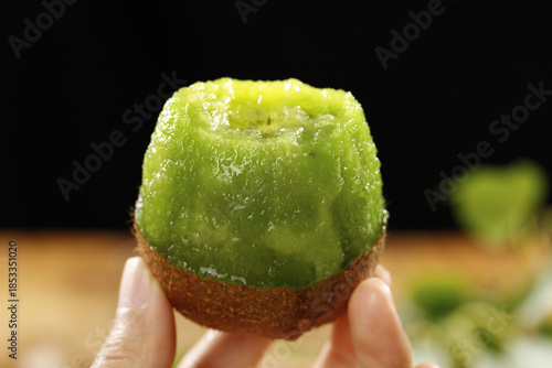 Fresh Green Kiwifruit Half with Water Droplets - Healthy Food Still Life