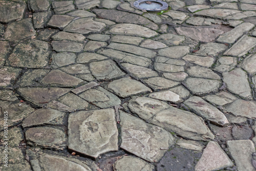 Obraz na plátně The texture of the stone road, pavement, walls of large gray
