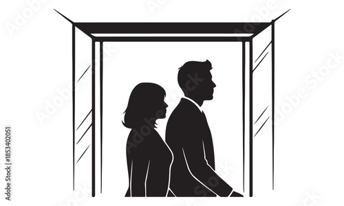 Businessman and businesswoman in elevator going up