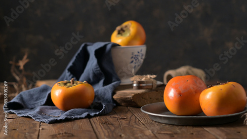 Fresh Persimmons in Rustic Still Life with Dark Moody Background