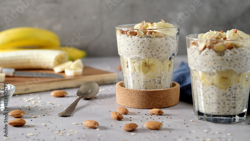 Healthy Chia Seed Pudding with Banana and Sliced Almonds in Glass