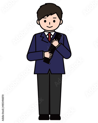 制服姿で卒業証書を抱える男の子