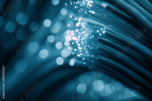 Abstract blue light streams symbolizing high-speed data flow, time, and digital connectivity.