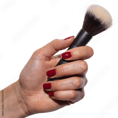 Professional Makeup Brush in Hand with Red Manicure | Beauty Cosmetics Application Tool on transparent background