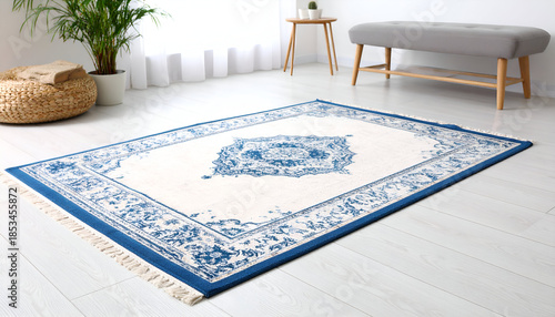 Exquisite blue and white patterned area rug, featuring intricate traditional designs, elegantly gracing a bright, modern living room with its luxurious texture and stylish home decor